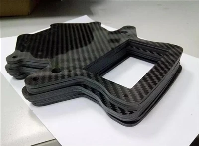How are carbon fiber parts made?